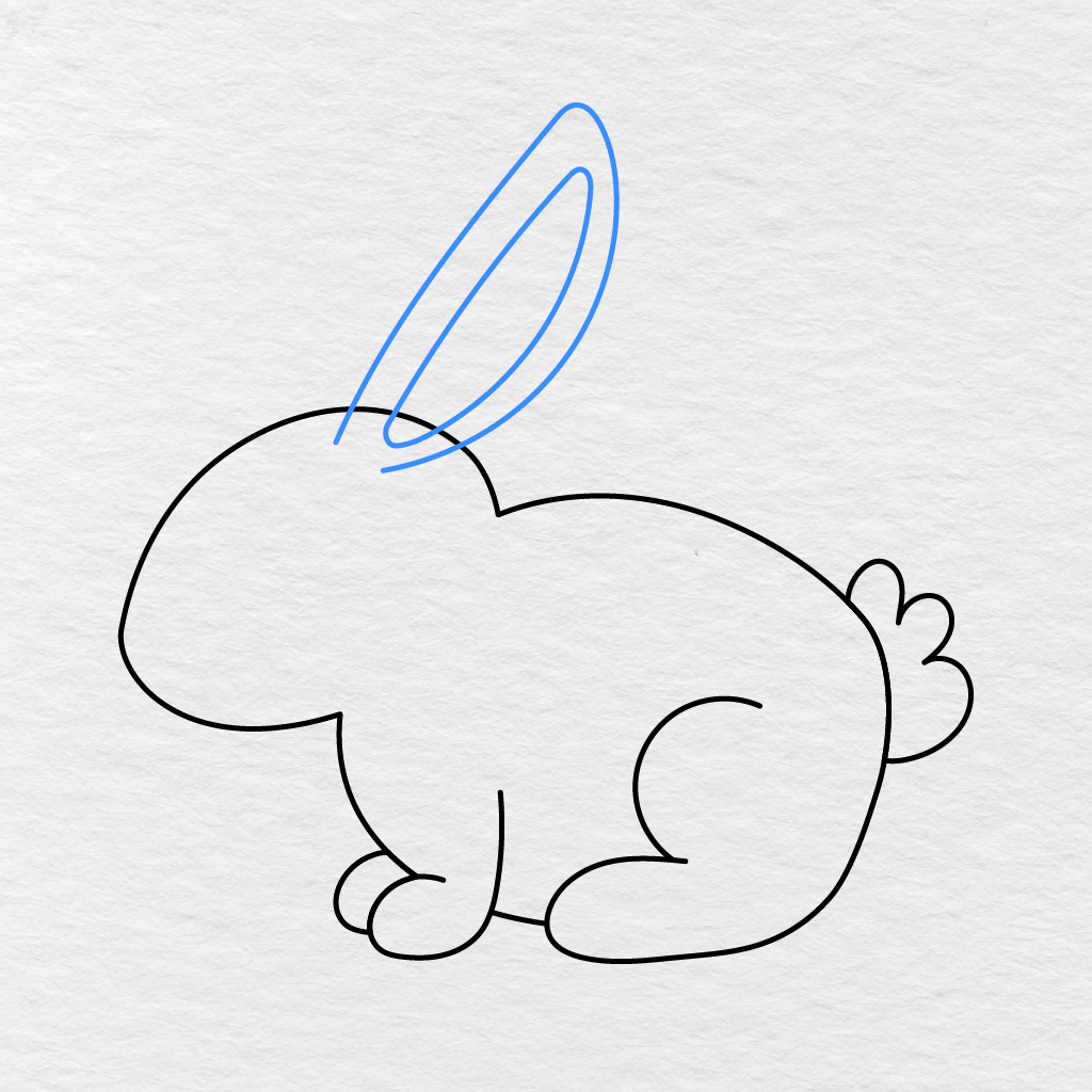 Step 6 Showing One Tall Front Ear With A Narrow Inner Section Added Above The Bunny’s Head.