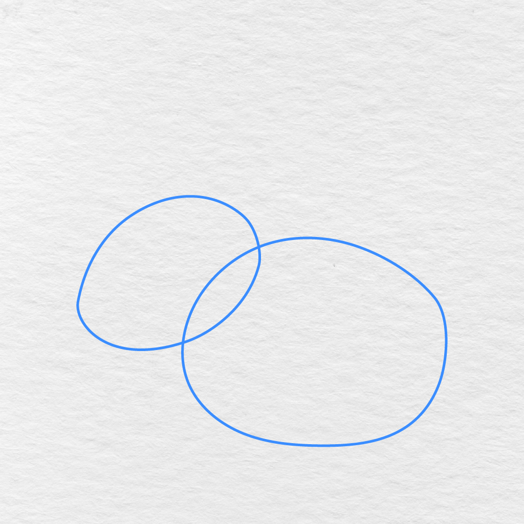 Step 1 Showing Two Overlapping Rounded Shapes Drawn As Guides For The Bunny’s Head And Body.