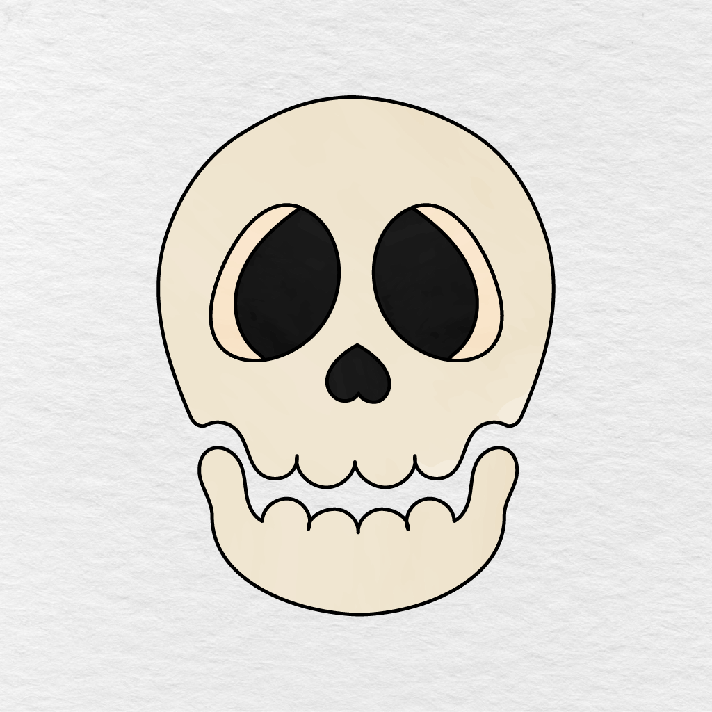 Step 8 Showing The Finished Skull Colored Light Cream With Peach And Black Details.