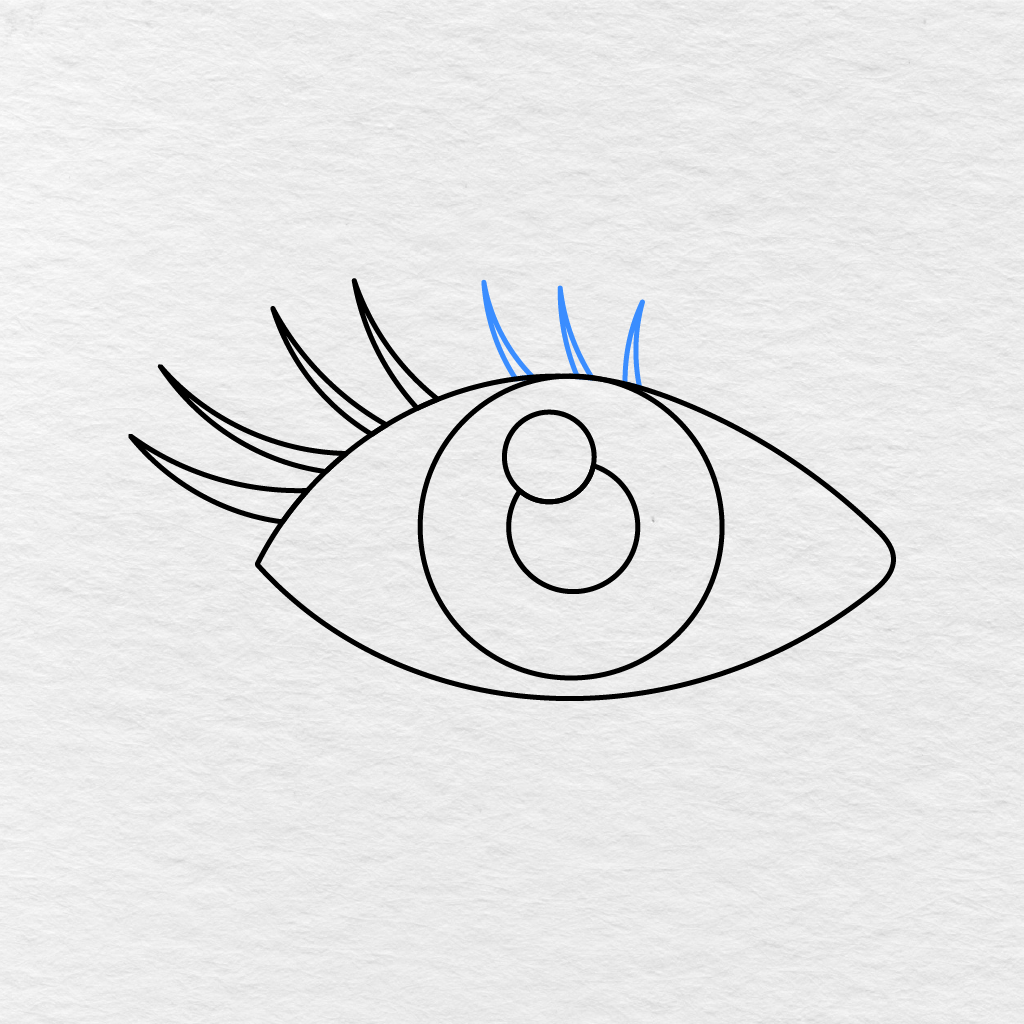 Step 6 Showing Three Pointed Eyelashes Added Above The Middle Of The Eye.